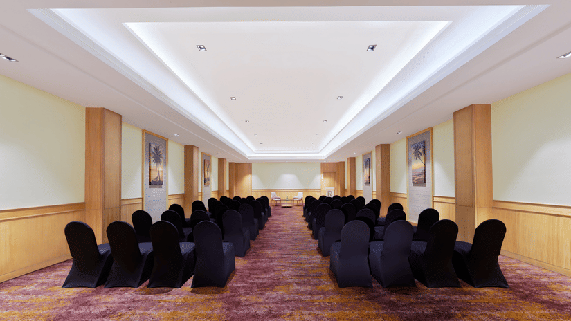 An overview of the Harbour Hall with chairs facing towards the stage | The Resort, Mumbai
