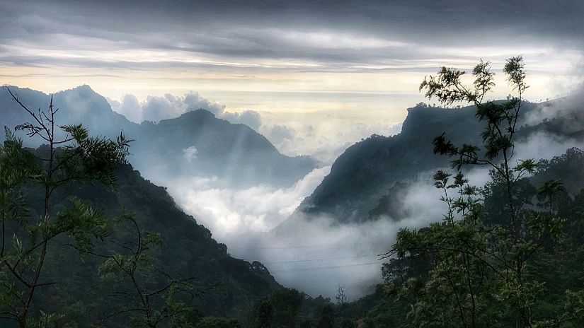 An incredible view of mist surrounding the hills in Kotagiri - tourist places near coimbatore - Ibex Stays & Trails, Coonoor (Leewood).