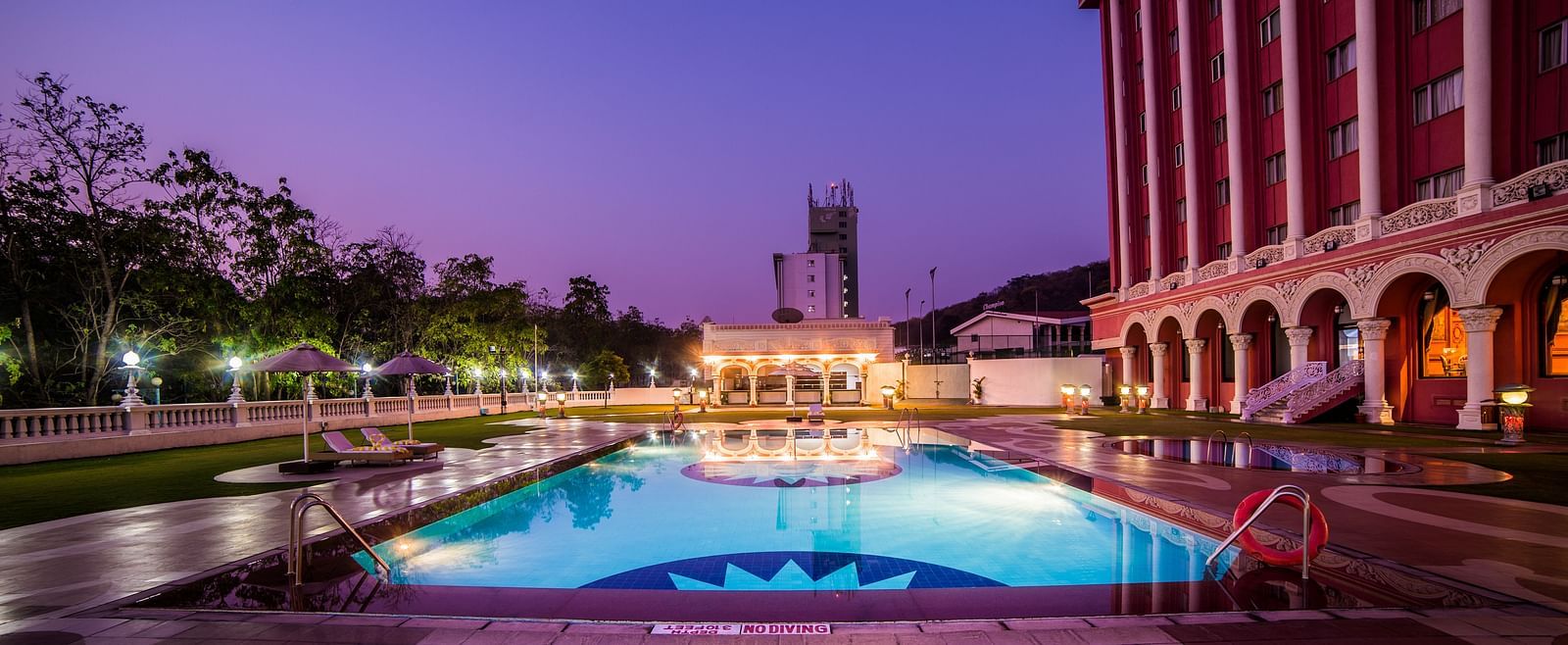 Swimming pool at Sitara Luxury Hotel in Hyderabad near Ramoji Film City during blue hour