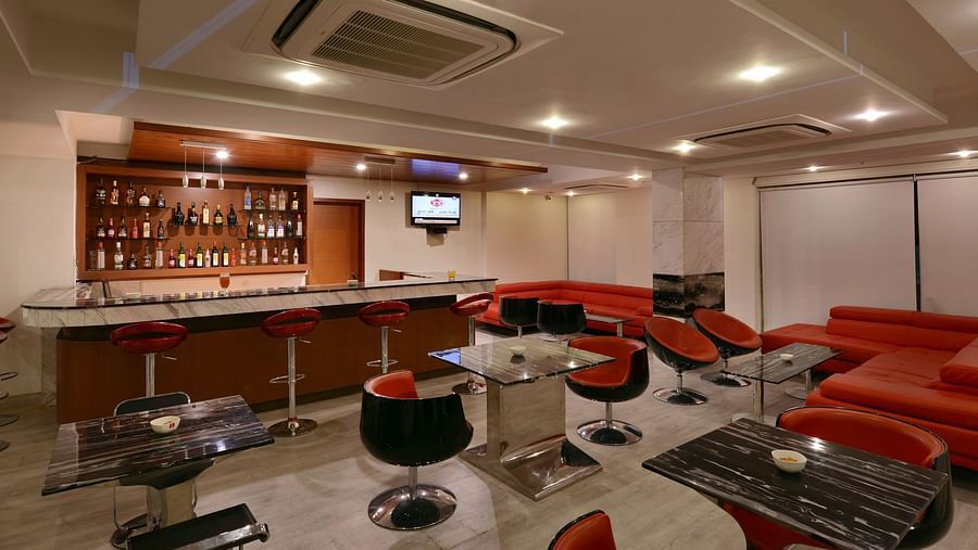 Image of Float Bar with chairs and tables and a bar section