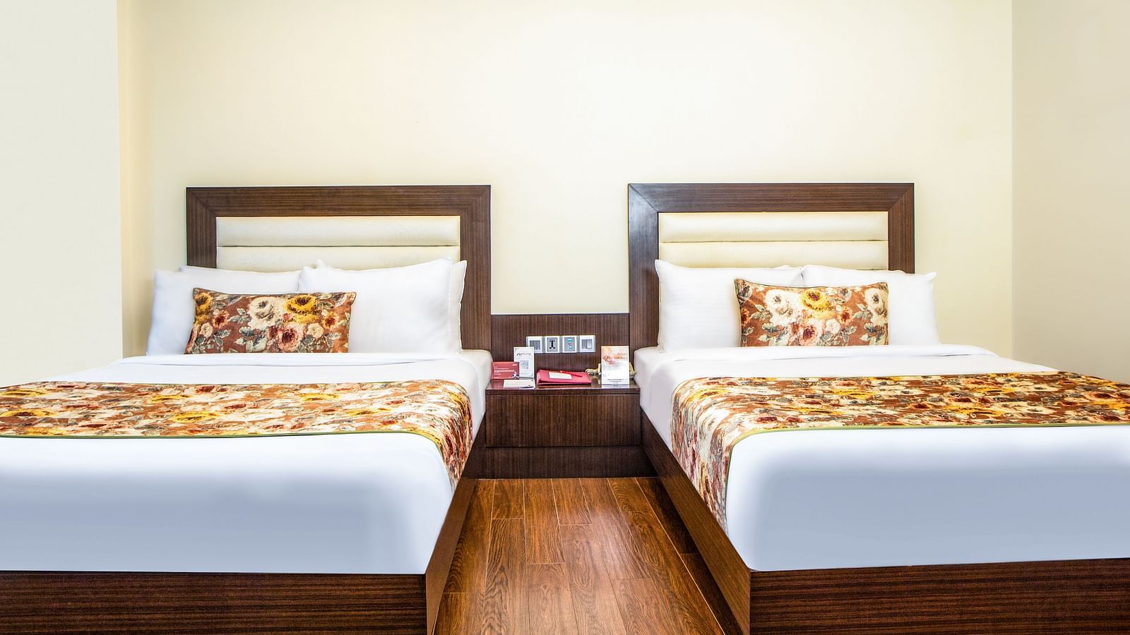 Family Suite with double bed with wooden bed side table