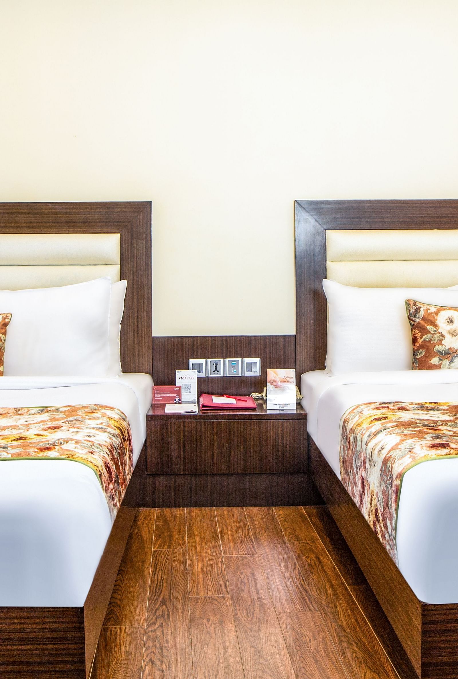 Family Suite with double bed with wooden bed side table
