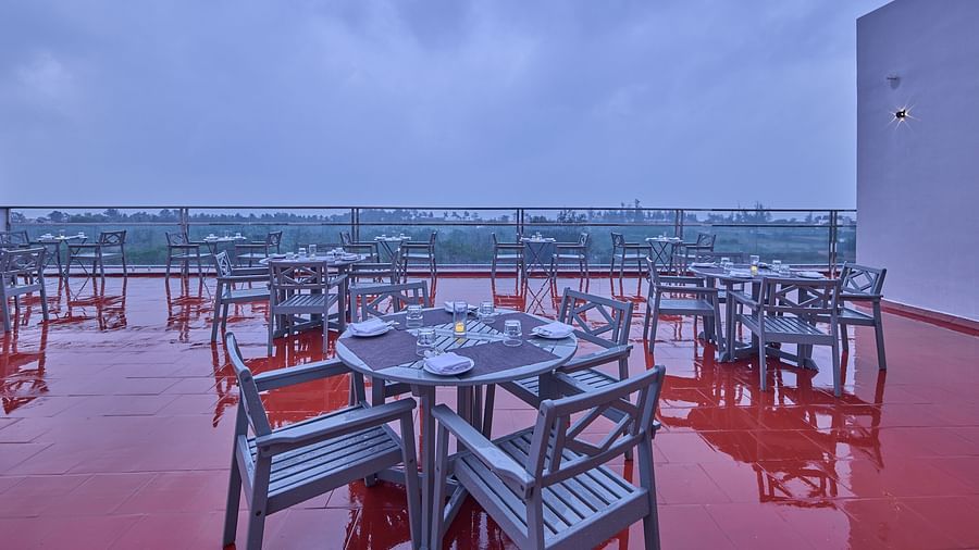 tables and chairs in our rooftop restaurant in Mahabalipuram - Grand Continent, Mahabalipuram