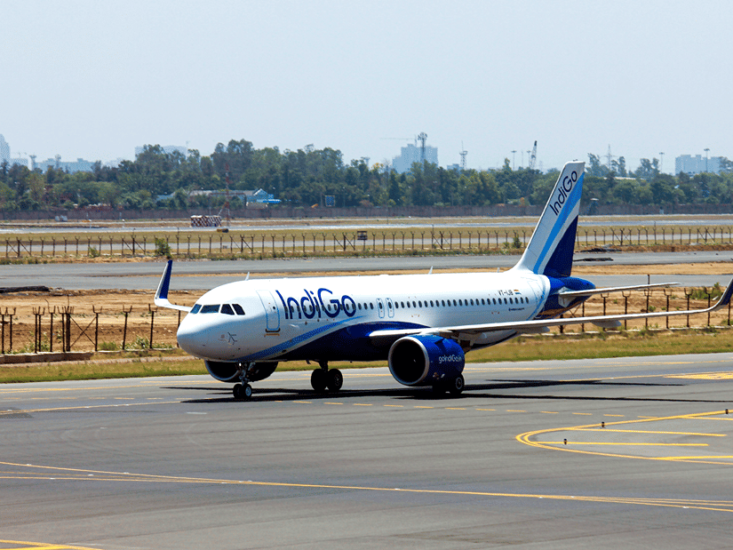 IndiGo, one of the flights from Chennai to Goa, on the runway on a sunny day