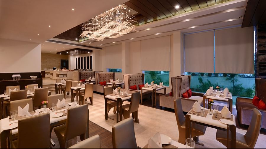 Image of Oasis restaurants dining area with chairs and tables 