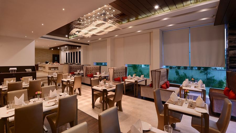 Image of Oasis restaurants dining area with chairs and tables 