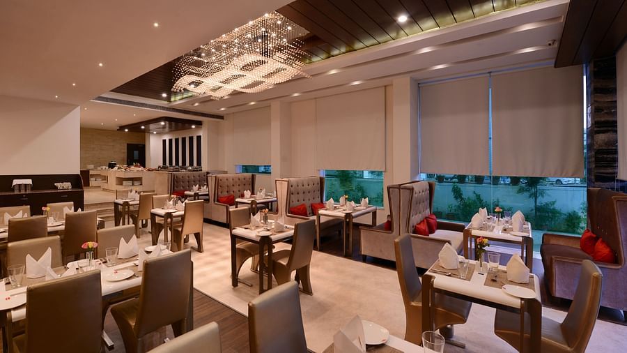 Image of Oasis restaurants dining area with chairs and tables 