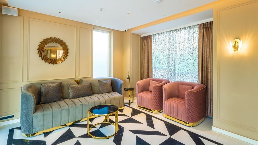 Sofa set and a coffee table in the Lobby | Renest Calangute, Goa