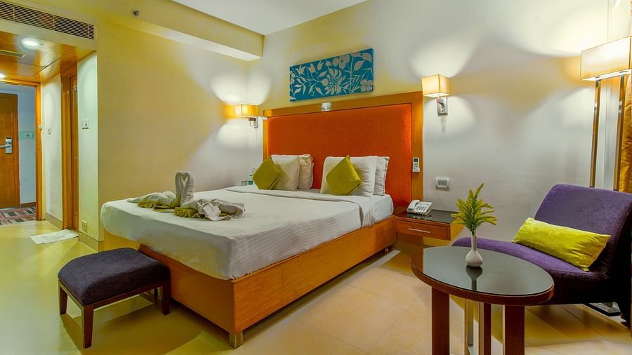 Super Premium Room with a bed and seating arrangements- GIS Select