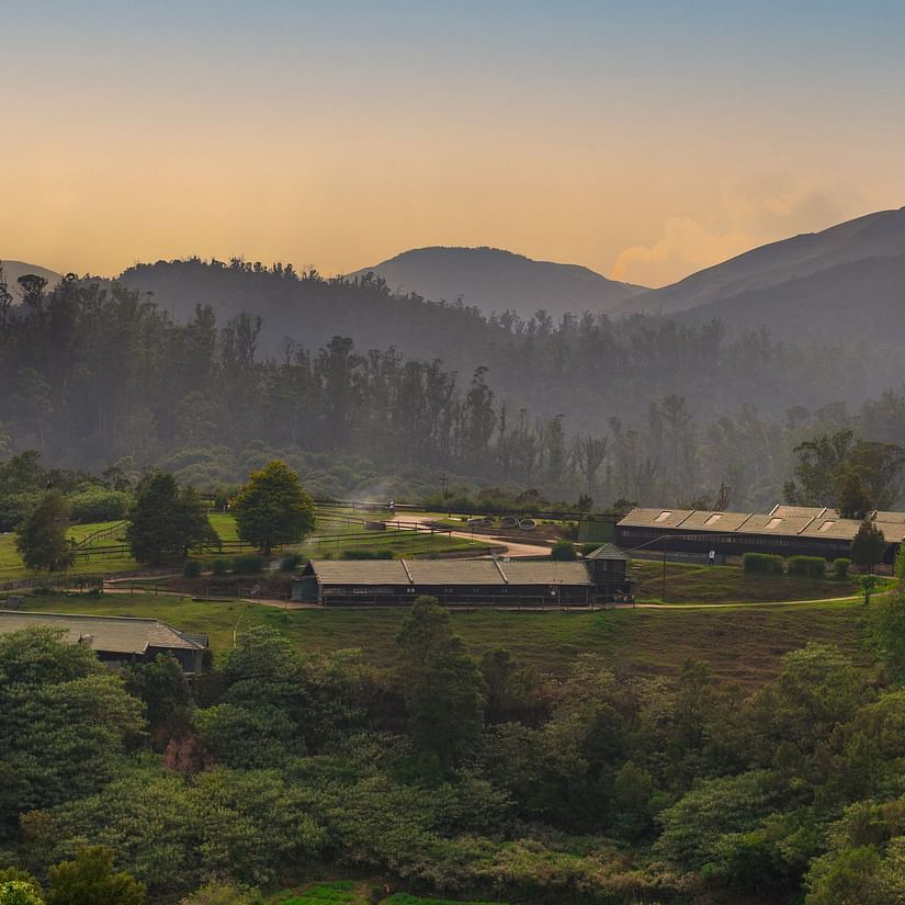 view of destiny the farm resort surrounded by lush green hills and mountains