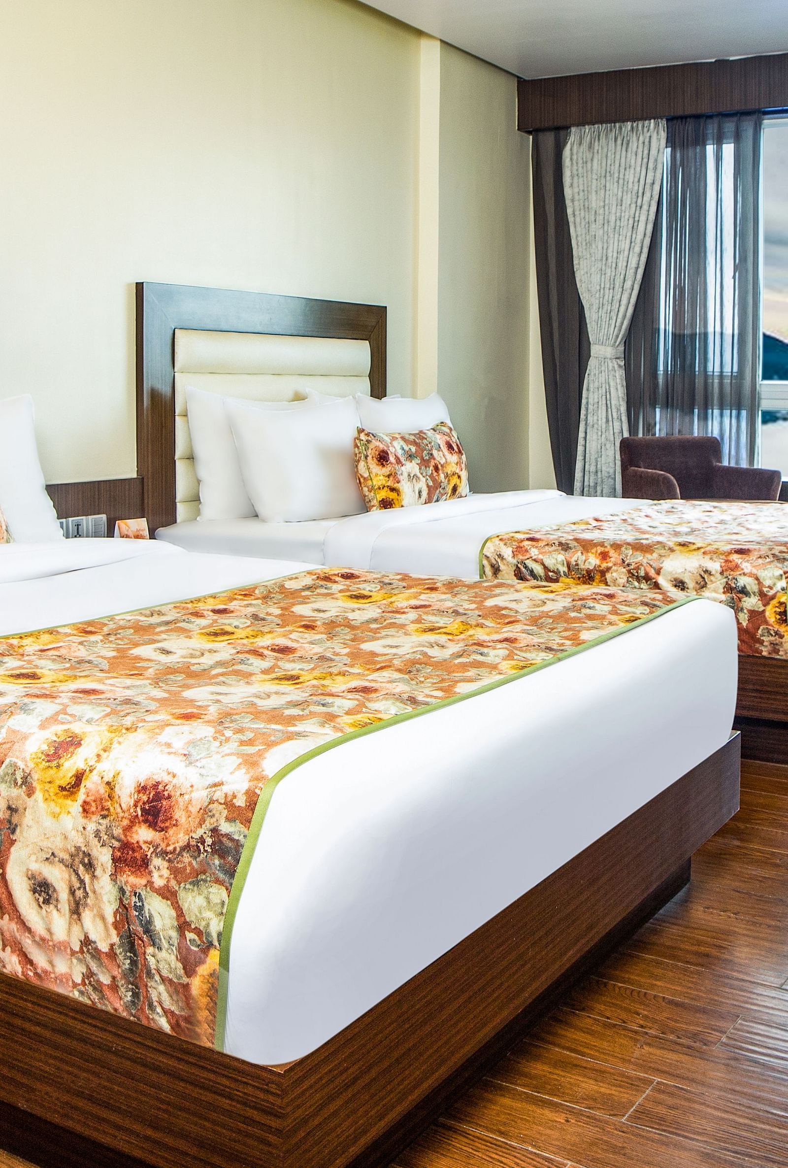 Family Suite View with spacious twin beds and wall mounted televison along with large windows
