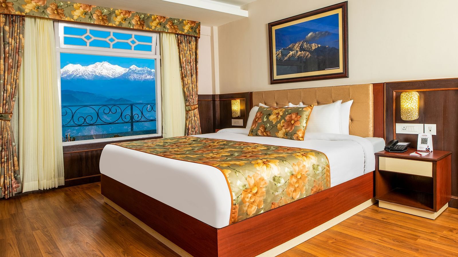 A side view of a bed in a room that has a glass window | Summit Oakden Resort & Spa, Mall Road