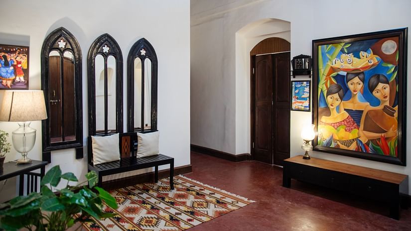 Beautiful lobby area with plants and painting @ Lamrin Ucassaim Hotel, Goa