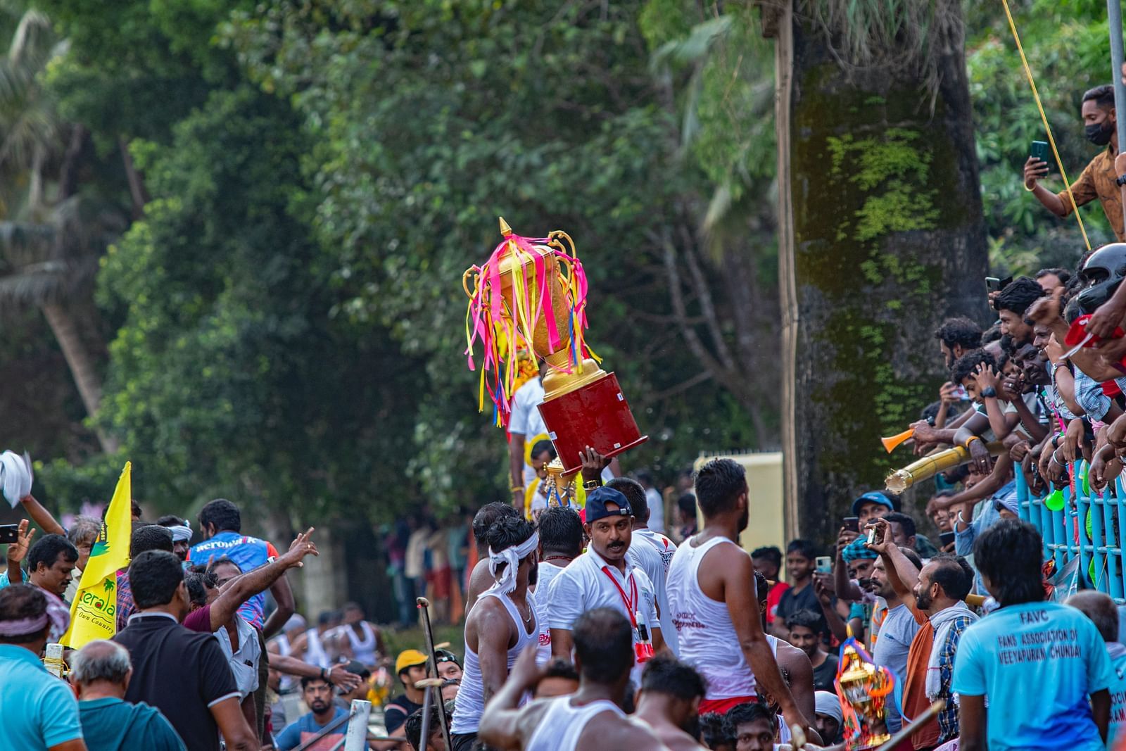 an image of People participating in Vallam Kali