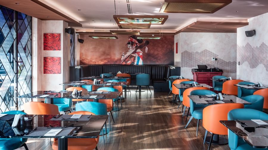 Wide view of the main restaurant floor at Best Western Premier Westlands with seating and tables.