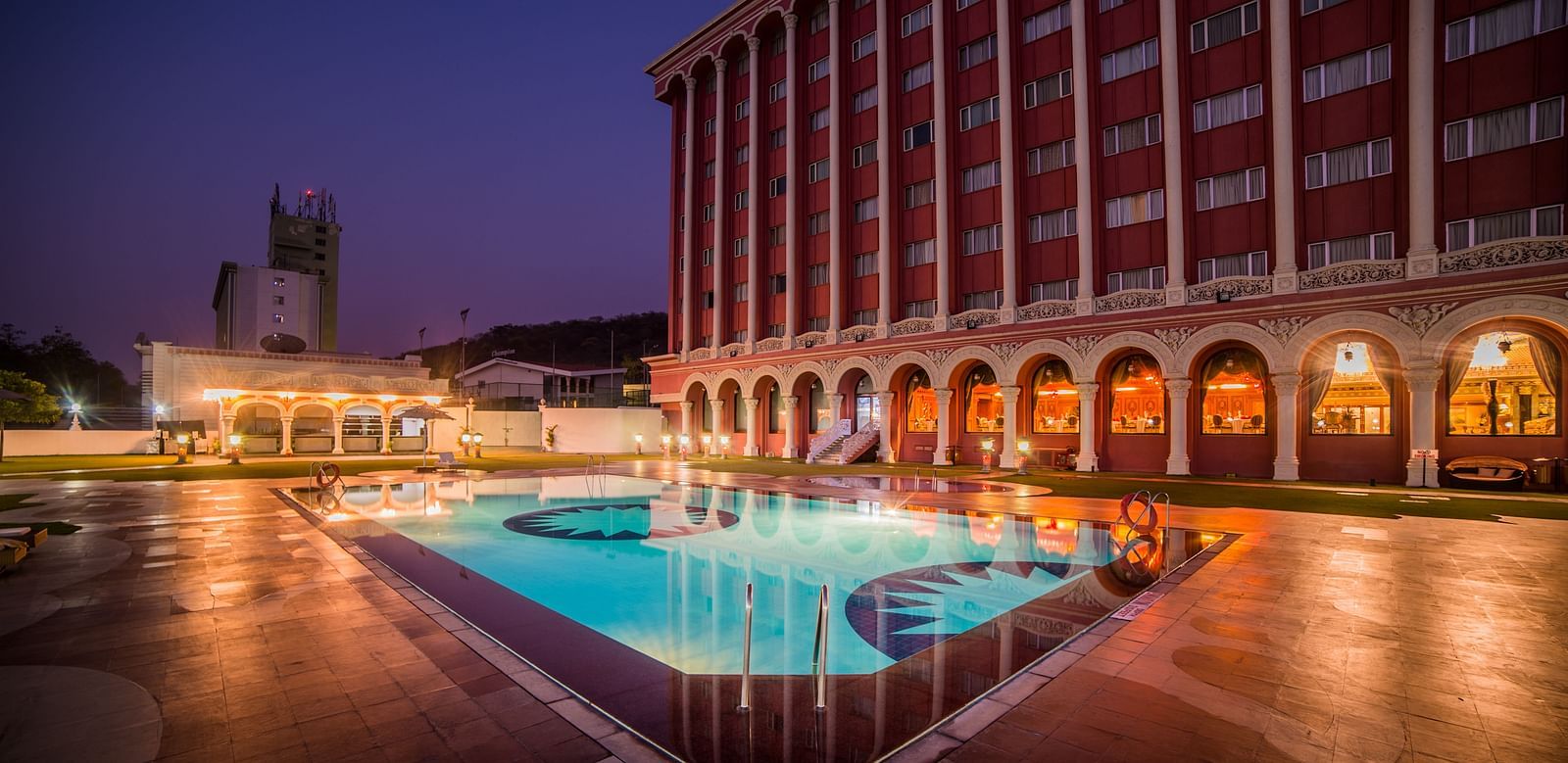 Swimming pool at Sitara Luxury Hotel in Hyderabad near Ramoji Film City during blue hour