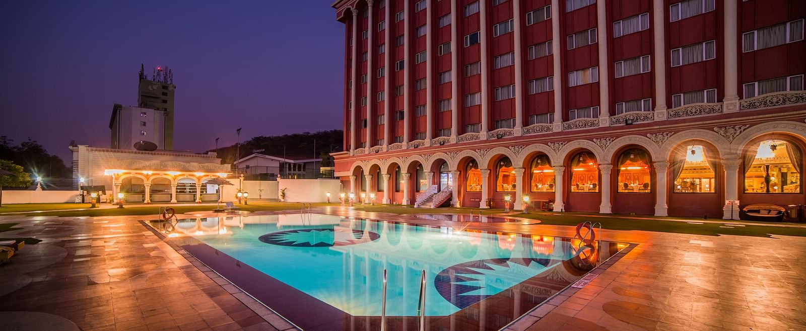 Swimming pool at Sitara Luxury Hotel in Hyderabad near Ramoji Film City during blue hour