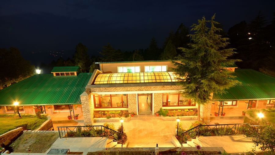 A stunning night view of the our dining area with glowing lights and serene surroundings - BluSalzz Escapade - Anant Rasa Resort