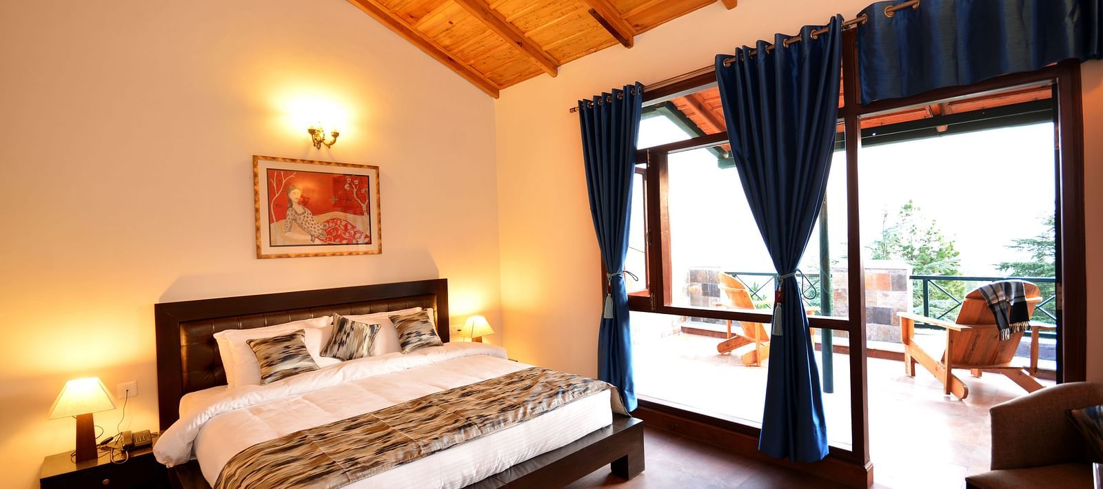 A beautifully designed room in almora with a king size bed and direct access to a private balcony - BluSalzz Escapade - Anant Rasa Resort