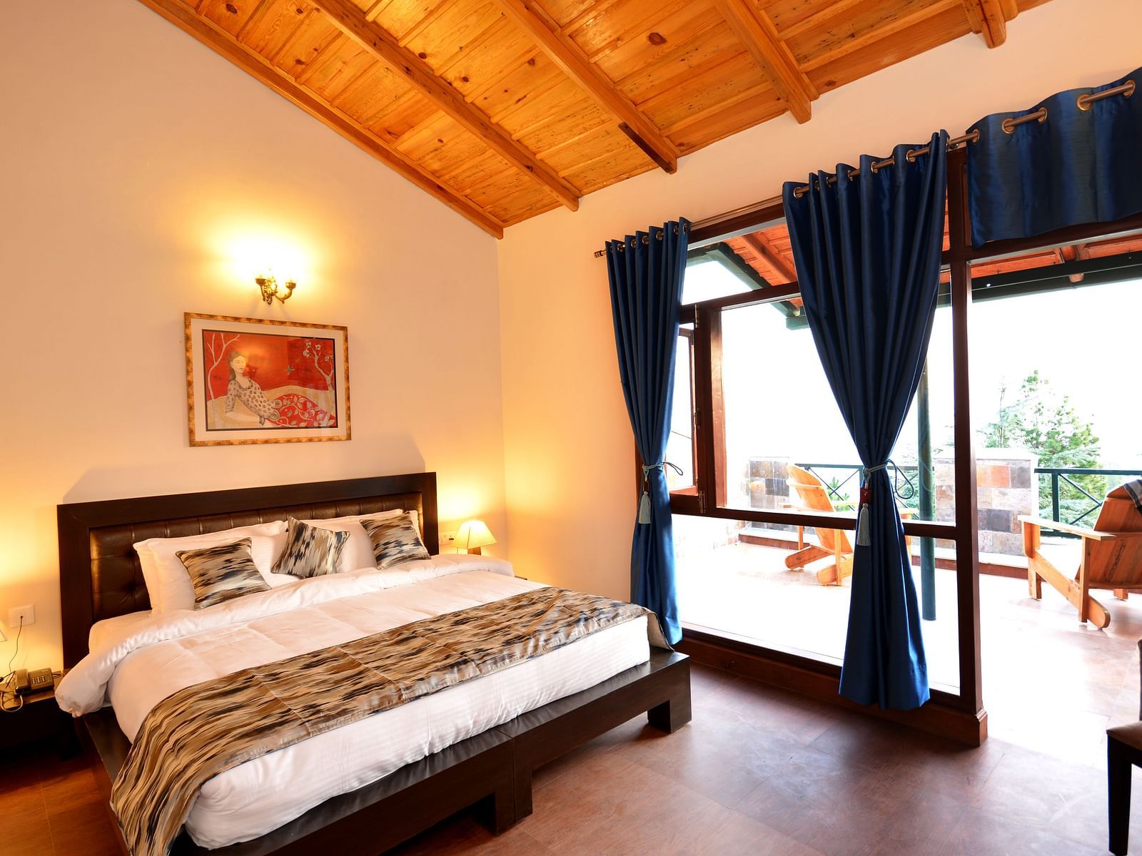 A beautifully designed room in almora with a king size bed and direct access to a private balcony - BluSalzz Escapade - Anant Rasa Resort