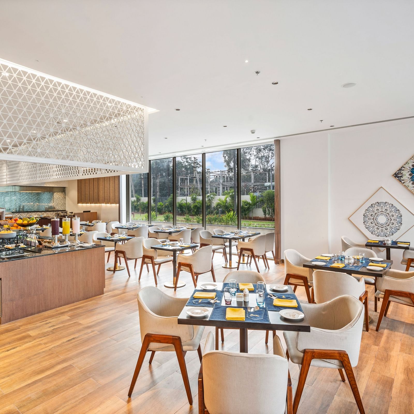 A dining setting at Grand Vijayawada Bazaar at Grand Vijayawada by GRT Hotels.
