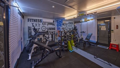 A wide angle shot of a fitness centre in Brookefield filled with equipment like treadmills and cycles - Grand Continent, Brookefield
