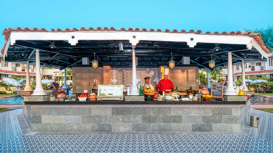 exterior - pool sunken bar in goa at heritage village resort and spa