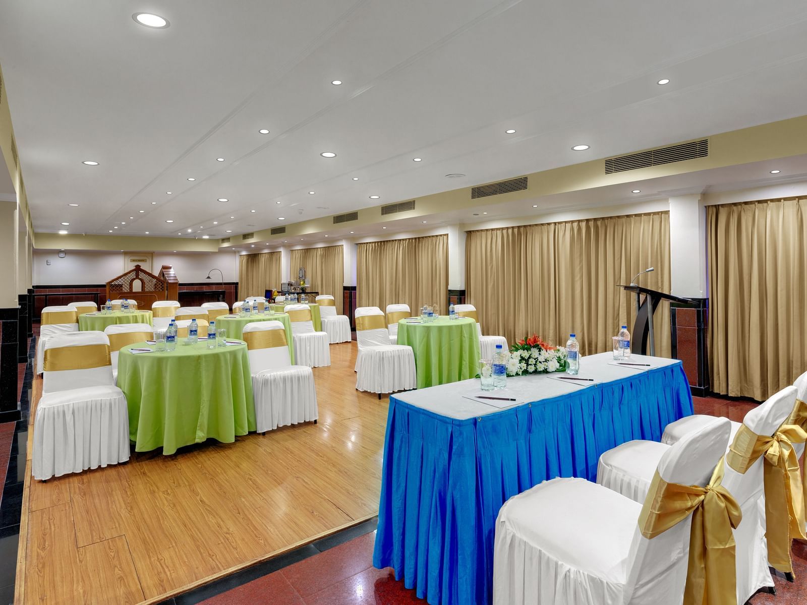 Round table seating arrangement in banquet hall at SRM Hotel Maram Malai Nagar, Chennai