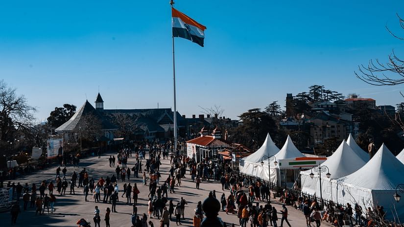 Large open space in Shimla with an Indian flag on a pole