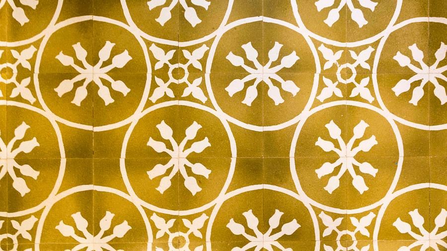 an image of Floral floor pattern on yellow tiles - Rhythm Lonavala