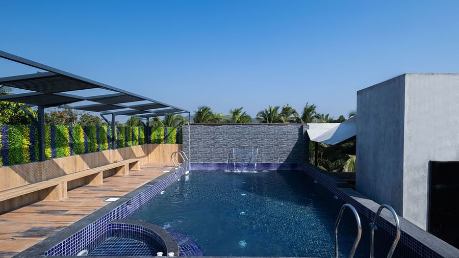 A full view of the swimming  pool during the day | Renest Calangute, Goa