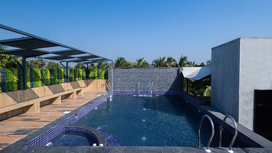 A full view of the swimming  pool during the day | Renest Calangute, Goa