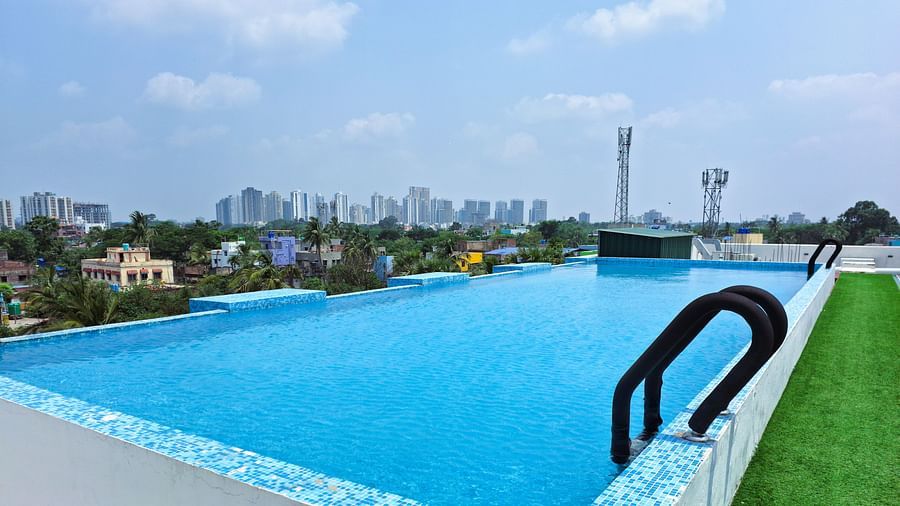 Scenic rooftop pool overlooking the skyline at Starlit Suites, Kolkata
