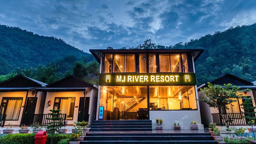 Facade view of DLS MJ River Resort, Rishikesh on a cloudy evening.