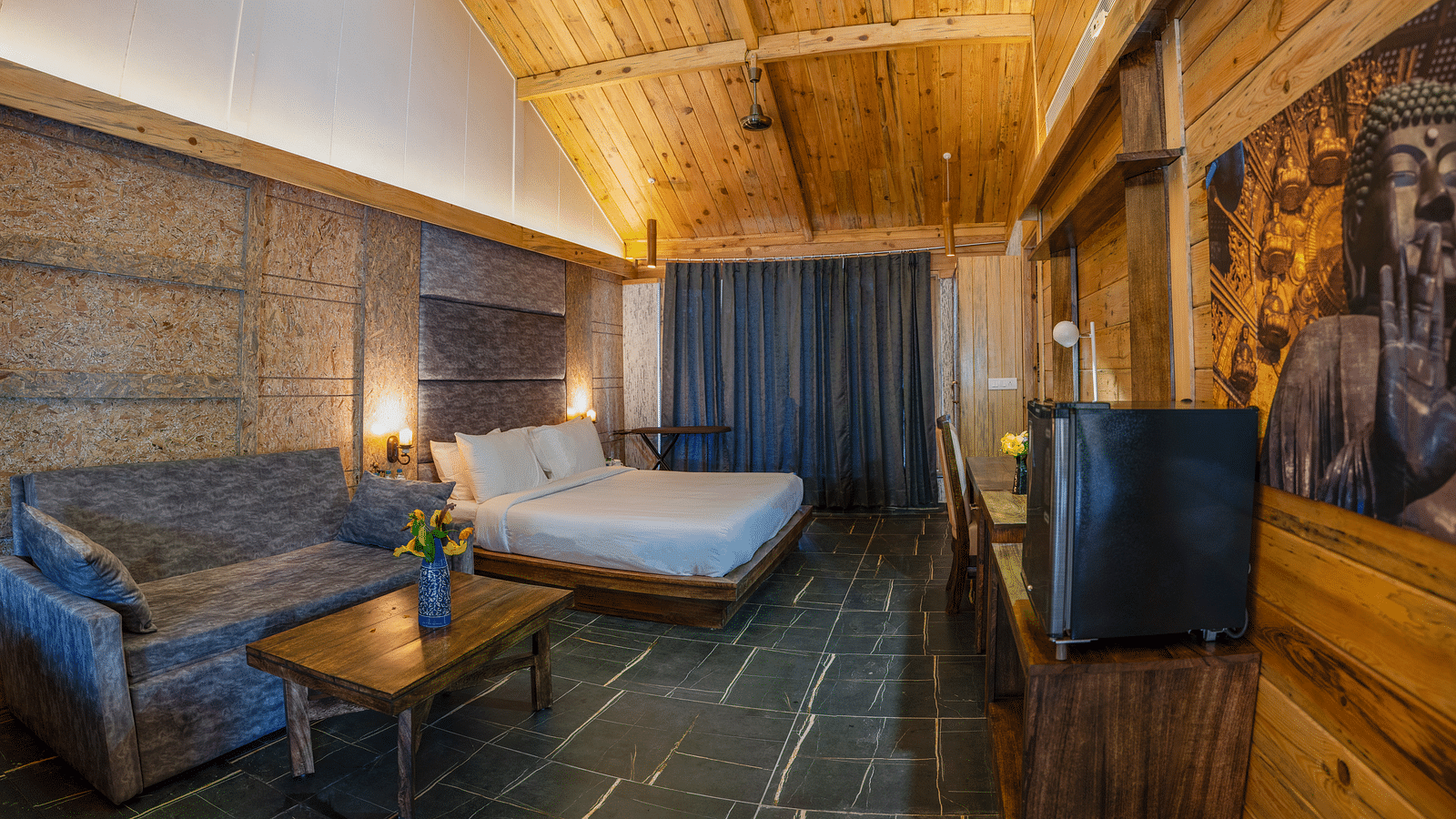 A view of the Master Suite with a large bed at the Sylvan Retreat, Dehradun.