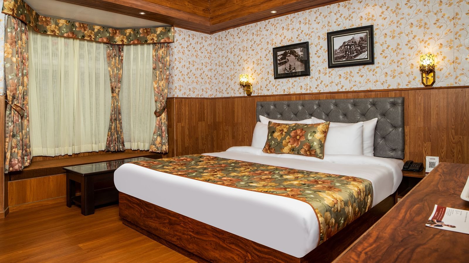 A bed in a room that has a glass window | Summit Oakden Resort & Spa, Mall Road