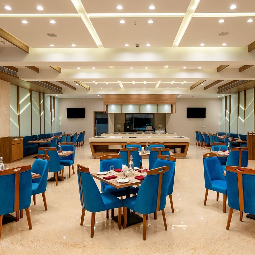 Seating arrangements inside the restaurant - The Orchid Hotel, Jamnagar - Boulevard Jamanagar