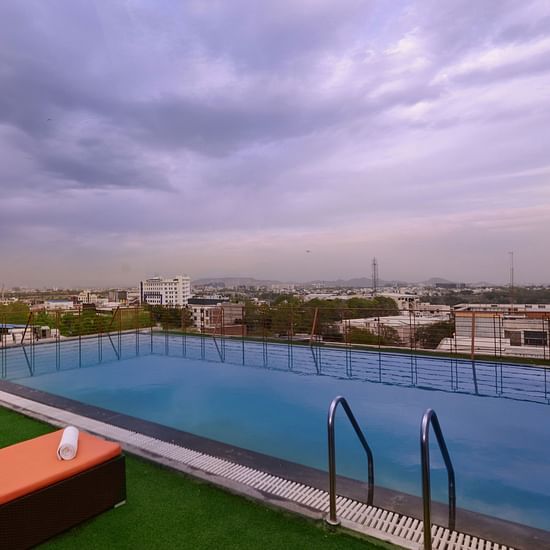 Rooftop Swimming pool with lounge chairs
