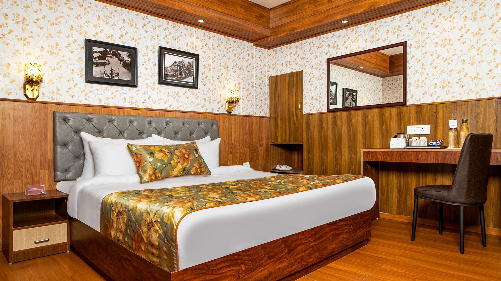 A bed in a room that has a chair and work desk | Summit Oakden Resort & Spa, Mall Road