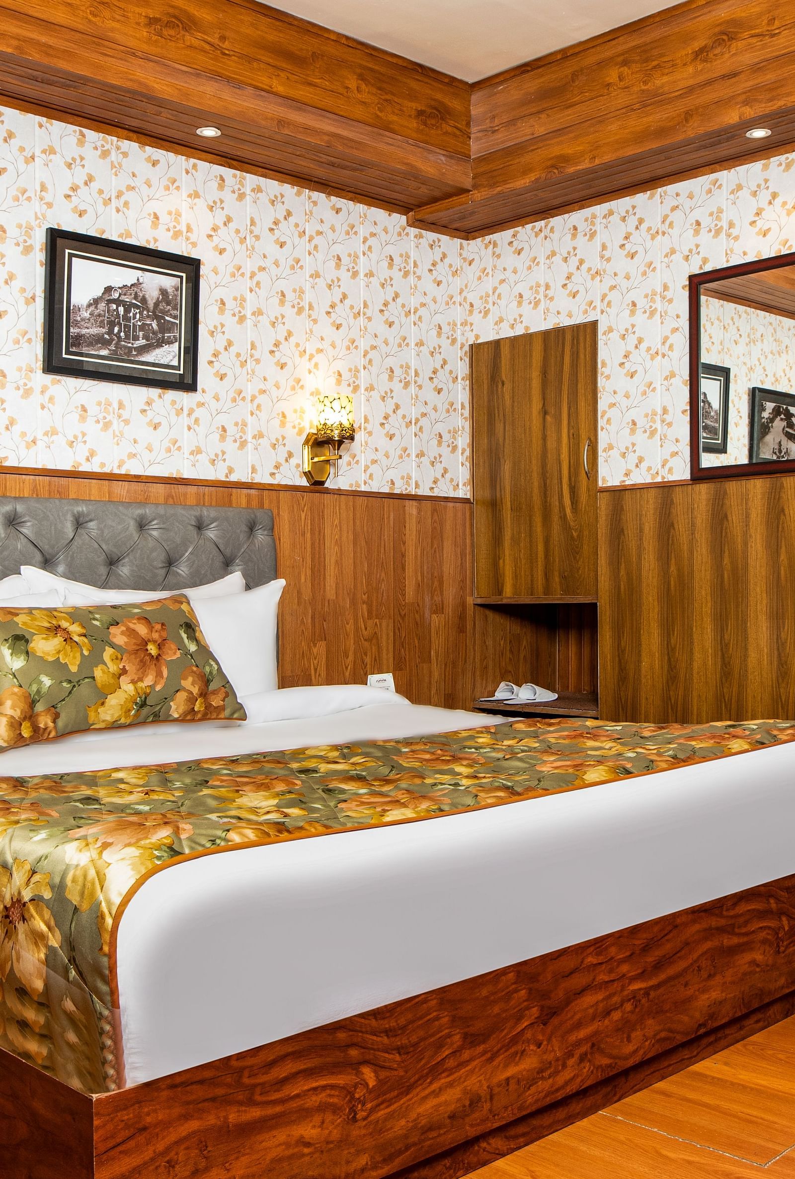 A bed in a room that has a chair and work desk | Summit Oakden Resort & Spa, Mall Road