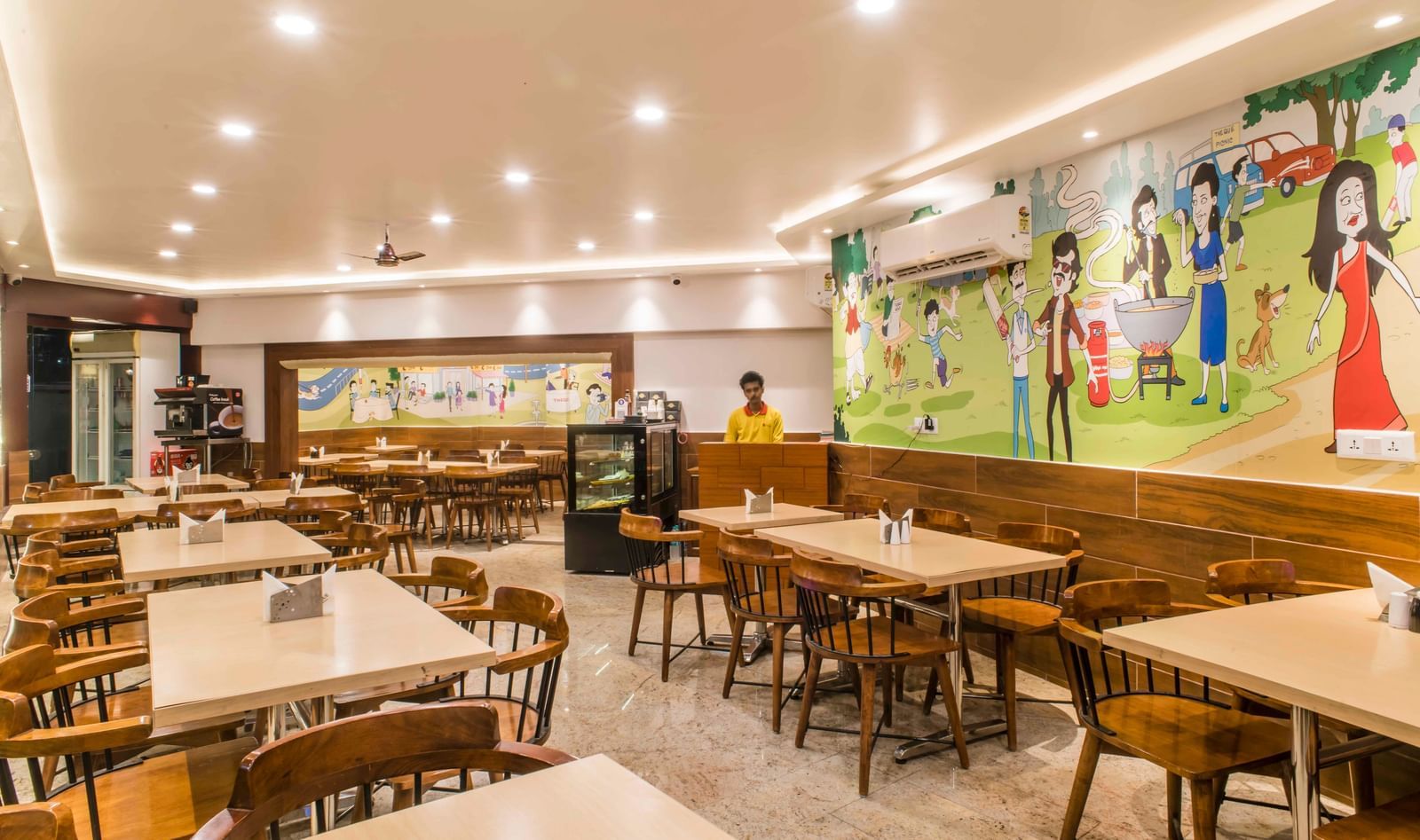 A cosy and well-furnished indoor dining space at The Citi Residenci Hotel, Durgapur.