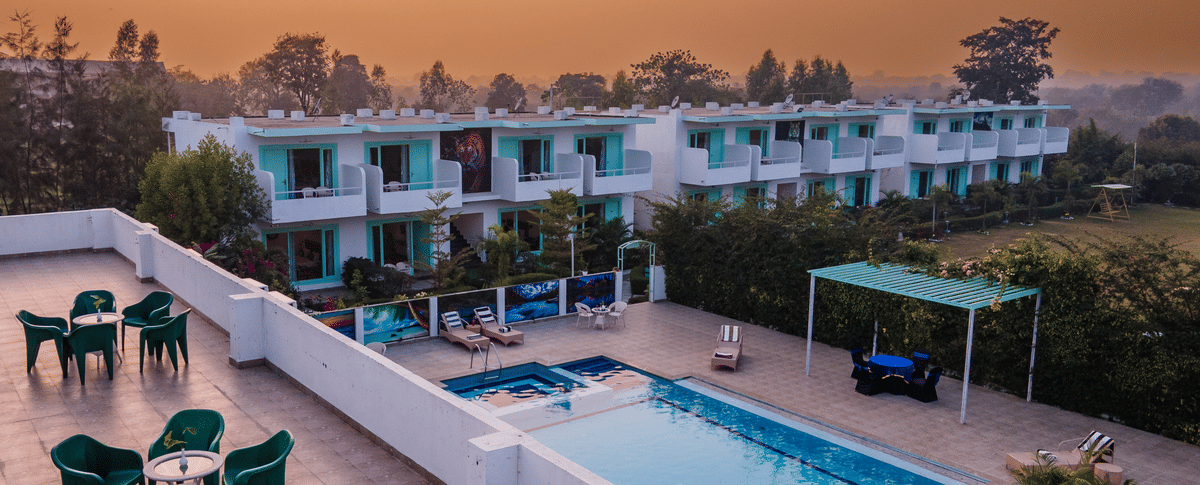 Facade of Vedikant Resorts The Mallard Corbett with the swimming pool