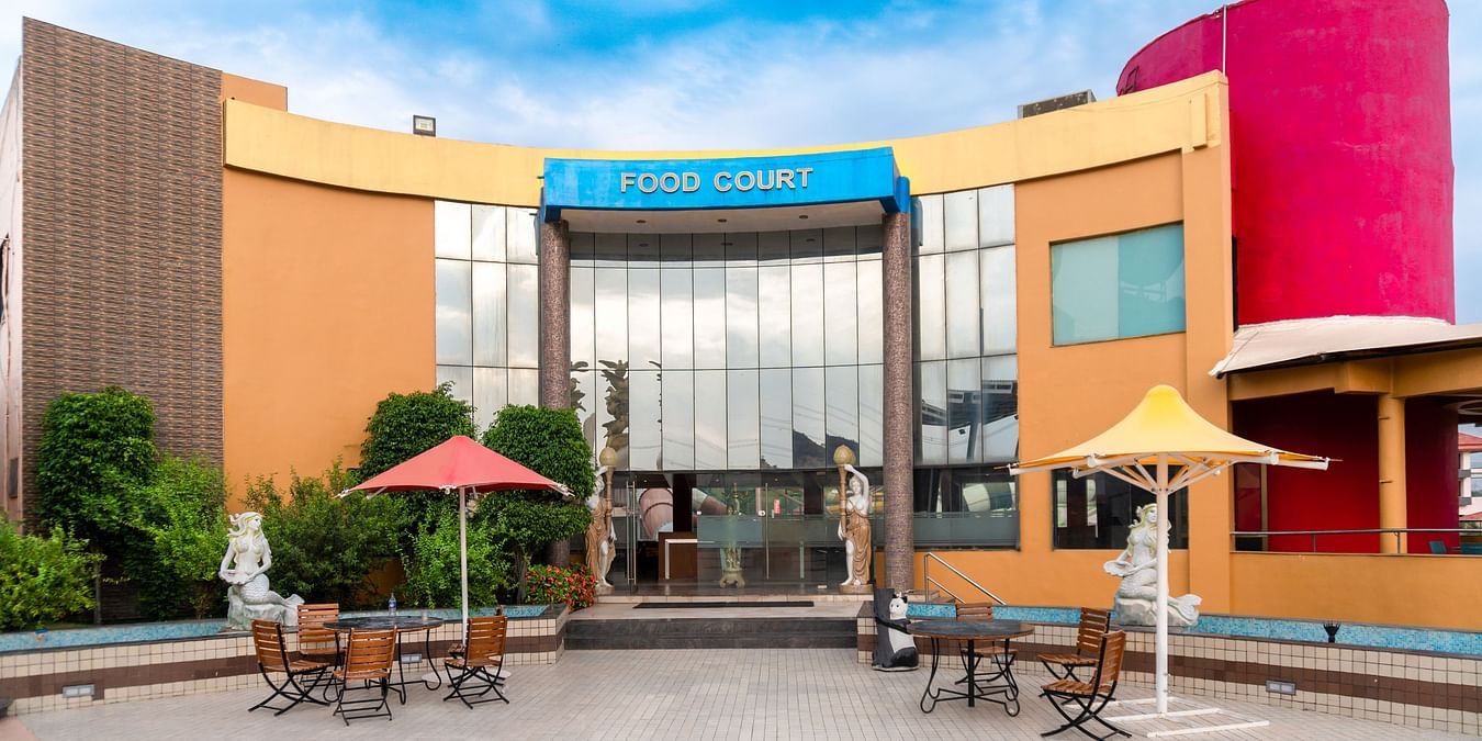 A wide shot of the food court at Crescent Water Park in Indore