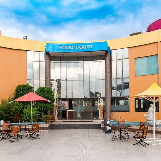 A wide shot of the food court at Crescent Water Park in Indore
