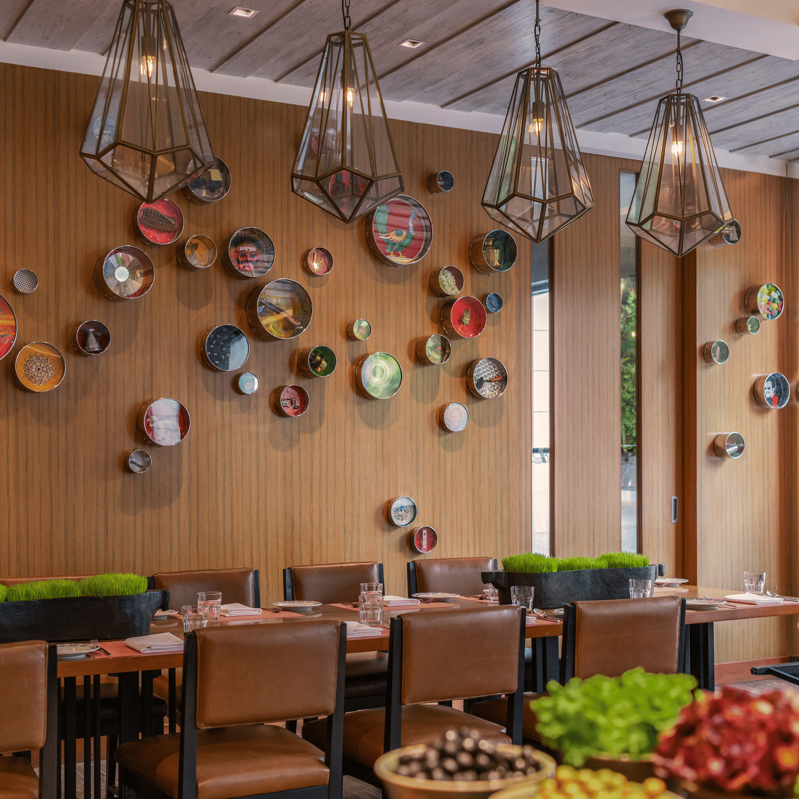 Indoor restaurant with colorful wall decor and dining tables at The Raintree, St. Mary’s Road.