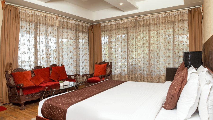 Premium Hill View Room accommodation at Mount Queens Hill Lake Resort and Spa Mirik