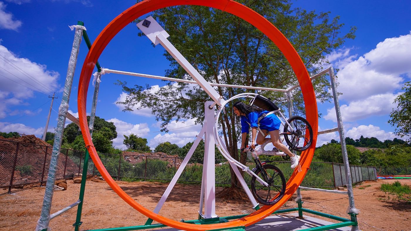 A person riding 360 degree cycle at Ravishing Retreat on a sunny day