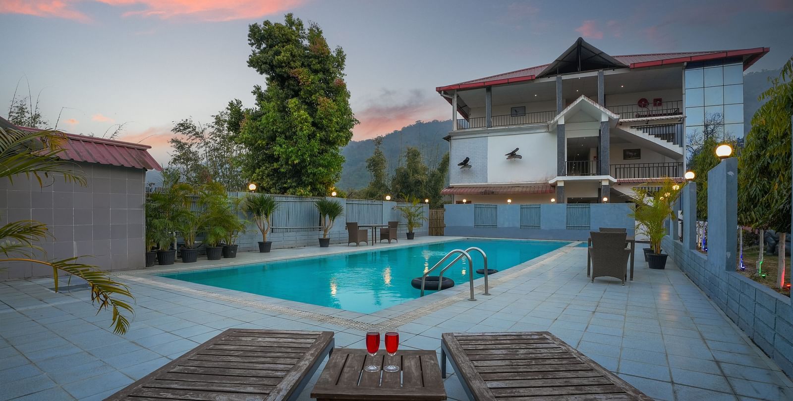 Pool evening view at Summit Green Lake Tea Resort & Spa, Kaziranga