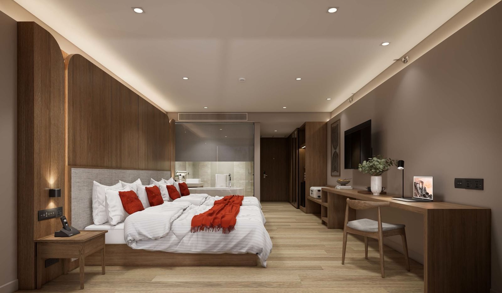 Modern bedroom with king bed, wooden decor, and desk at Ramada Resort by Wyndham Khao Lak.