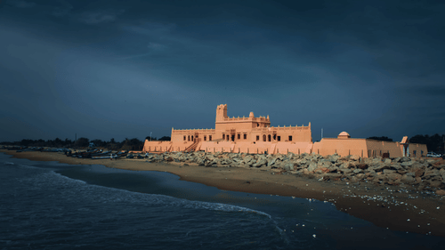Danish fort in Tranquebar facing the sea under a cloudy sky